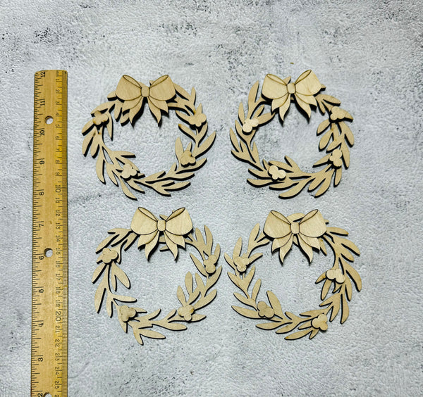 Set of 4 wreaths with bows