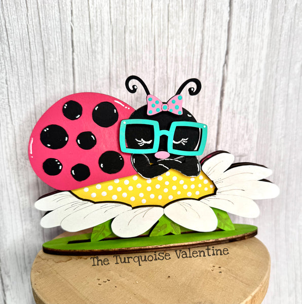 Ladybug sleeping on a flower shelf sitter DIY kit