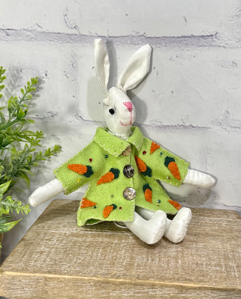 White bunny with green carrot coat