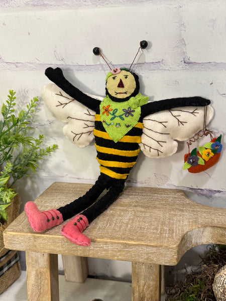Primitive bee with flower basket