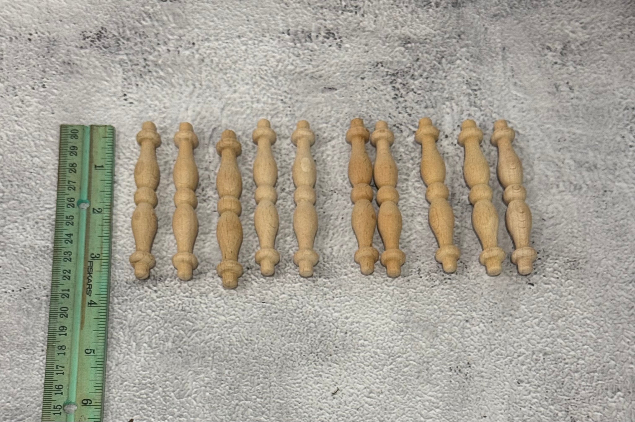 Set of 10 mini wood spindles