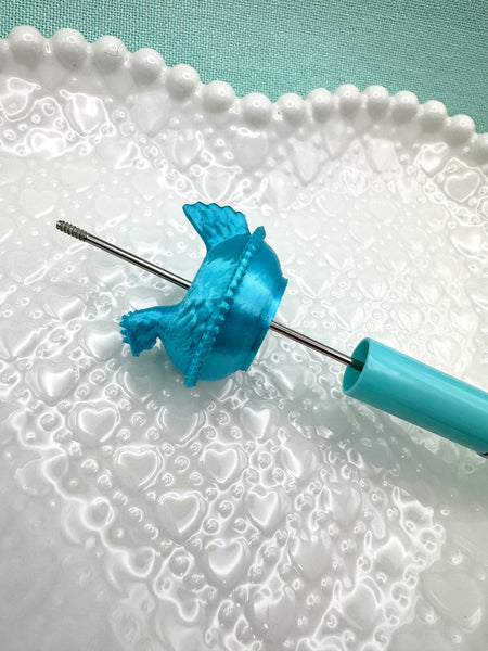 Silky teal blue hen on nest bead