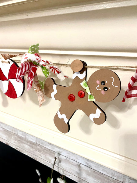 Hanging gingerbread man and peppermint DIY banner