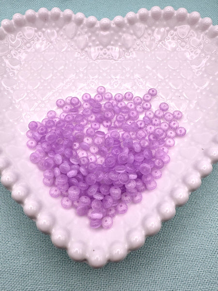 Lavendar cat eye glass donut beads