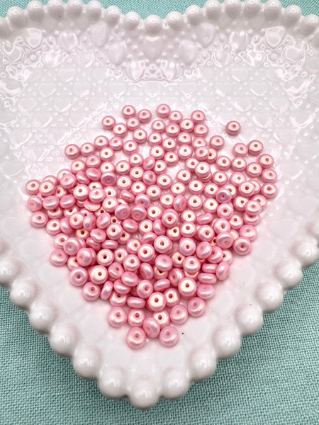 Golden pink glass donut beads