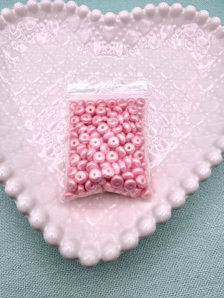 Golden pink glass donut beads