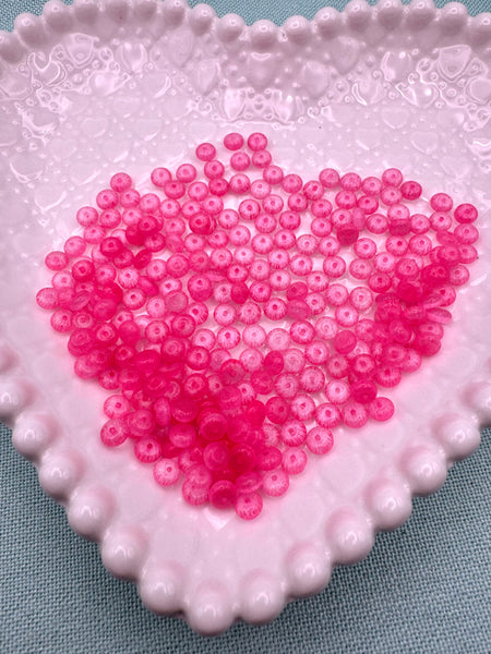 Pink cat eye glass donut beads
