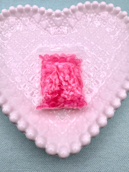 Pink cat eye glass donut beads