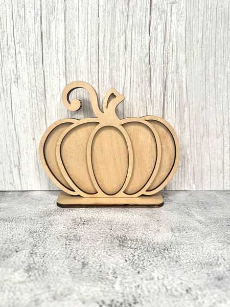 Standing pumpkin shelf sitter