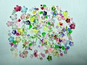 Flower beads and green seed beads for making flowers