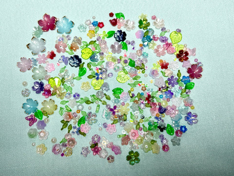 Flower beads and green seed beads for making flowers