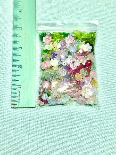 Flower beads and green seed beads for making flowers