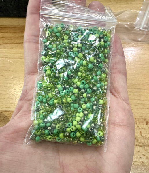 Flower beads and green seed beads for making flowers