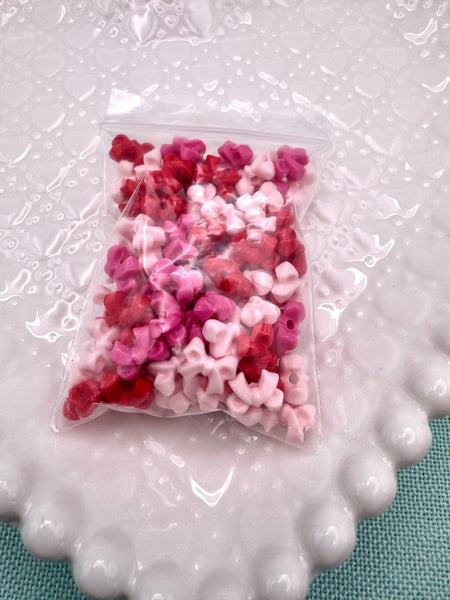 Red, hot pink and light pink tiny bow beads