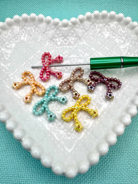Bow beads (6)