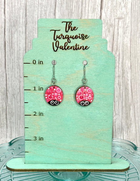 Small doodle bug earrings pink