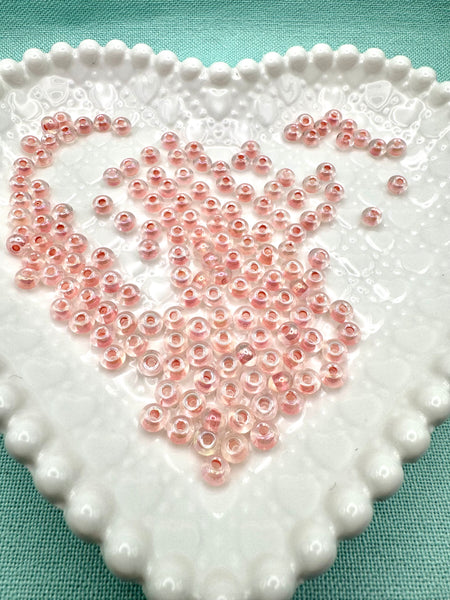 Pink and clear 6mm donut glass beads