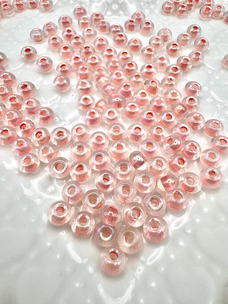 Pink and clear 6mm donut glass beads