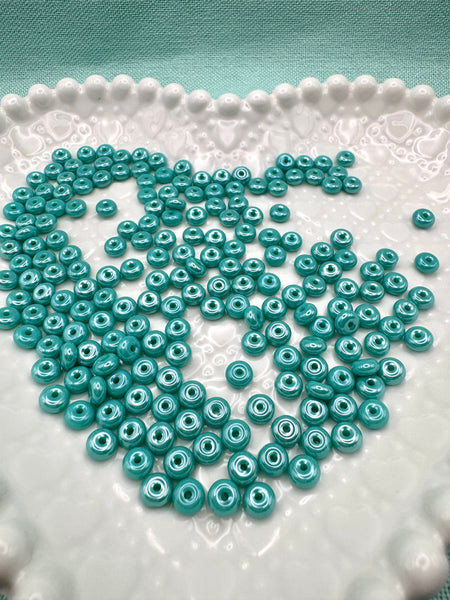 Turquoise 6mm glass donut beads