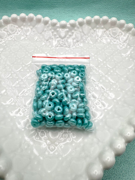 Turquoise 6mm glass donut beads