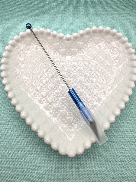 Beadable utility knife tool