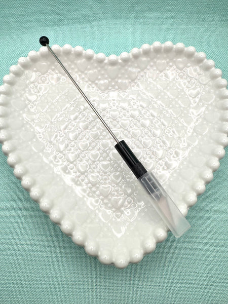 Beadable utility knife tool