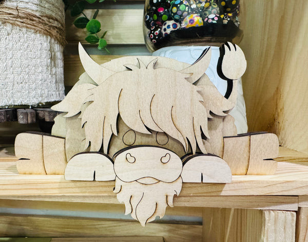 Highland cow ledge sitter