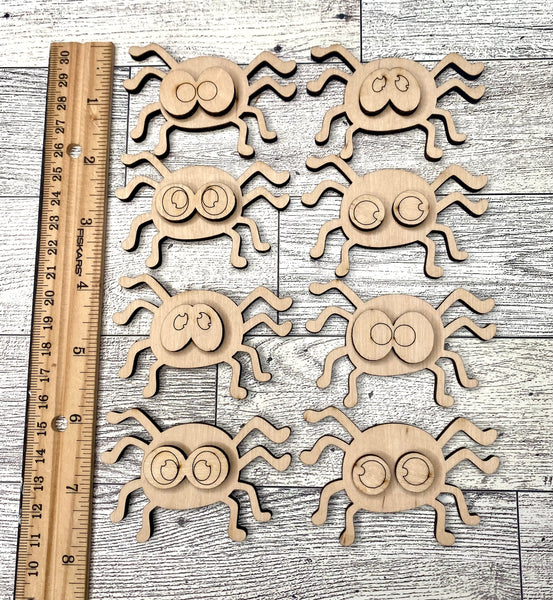 Set of eight mini spiders