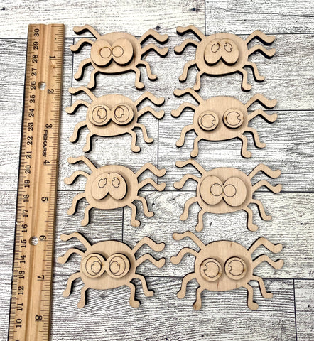 Set of eight mini spiders