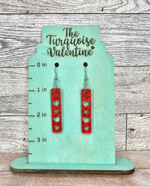 Red sparkle shimmer acrylic heart bar earrings